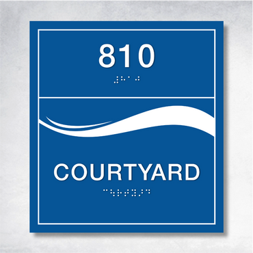 Accessible business signage featuring Braille and raised text for inclusivity and ADA compliance.